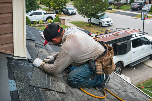 Professional Roof Leak Repair technician working in Dayville, CT